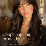 Femme avec une coupe butterfly brune et des mèches espresso, silhouette élégante.