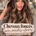Une femme avec des cheveux foncés et un style encadrant lumineux, mettant en valeur son visage.