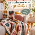 Un plaid au crochet moderne coloré drapé sur un canapé.